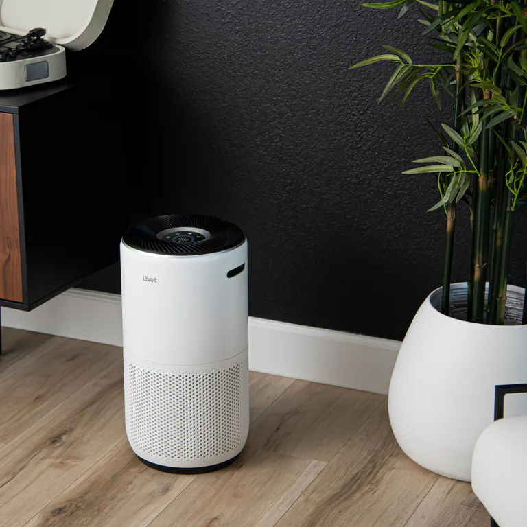 Levoit Core 400S smart air purifier with air quality display in a large room